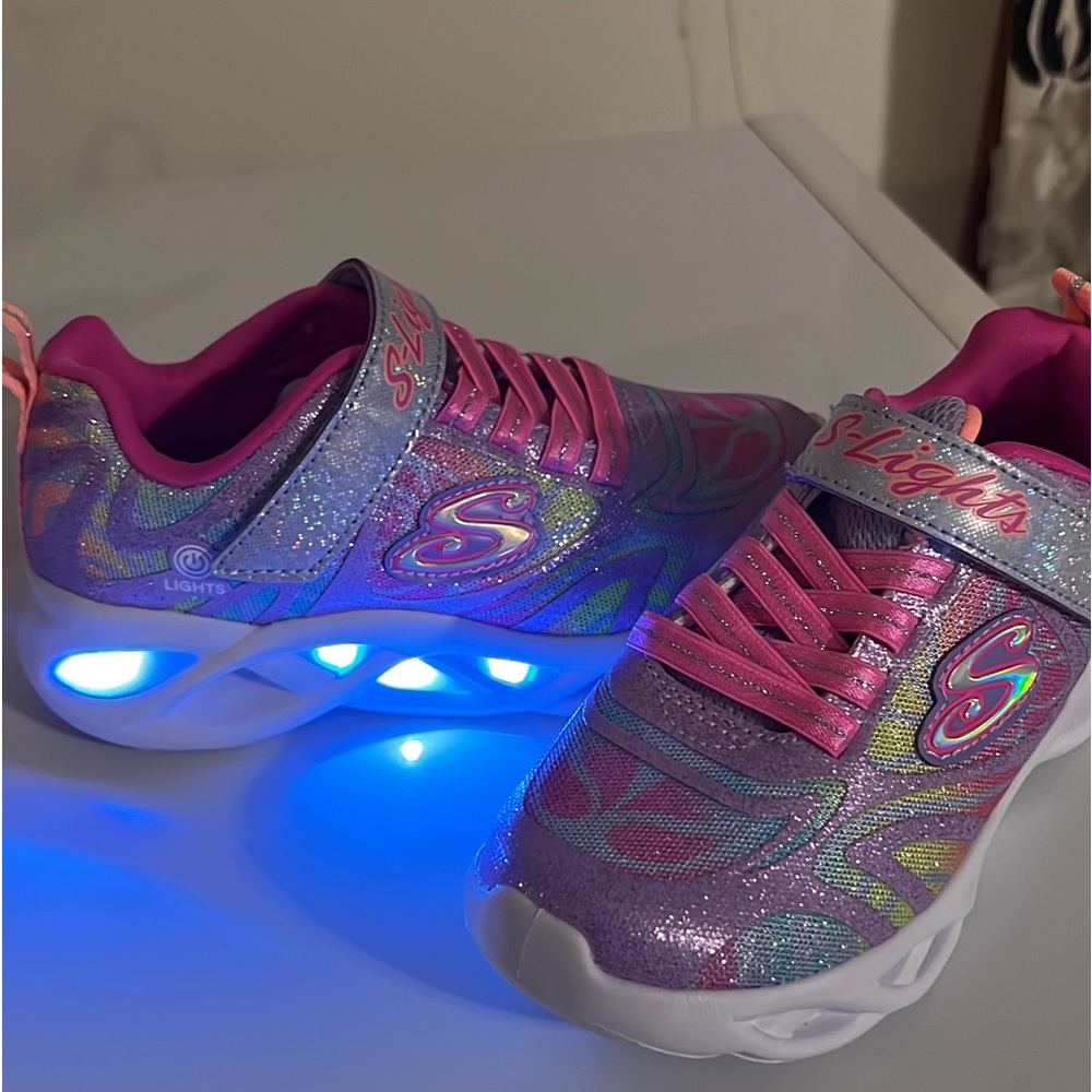 Skechers lights shoes new size 11. Never worn